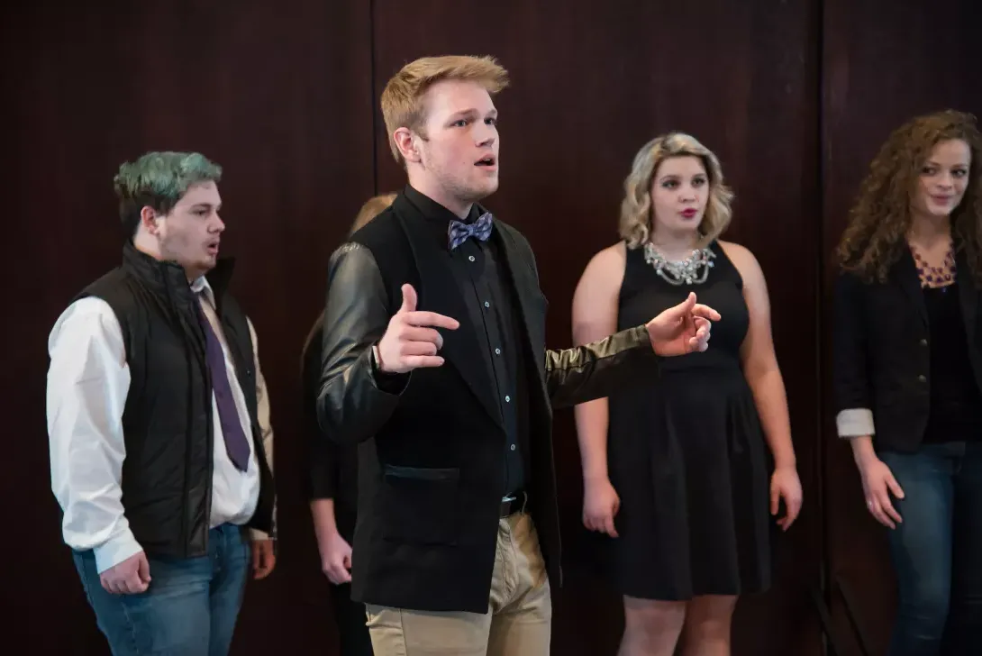 Members of AU's Surround Sound choir performing in concert